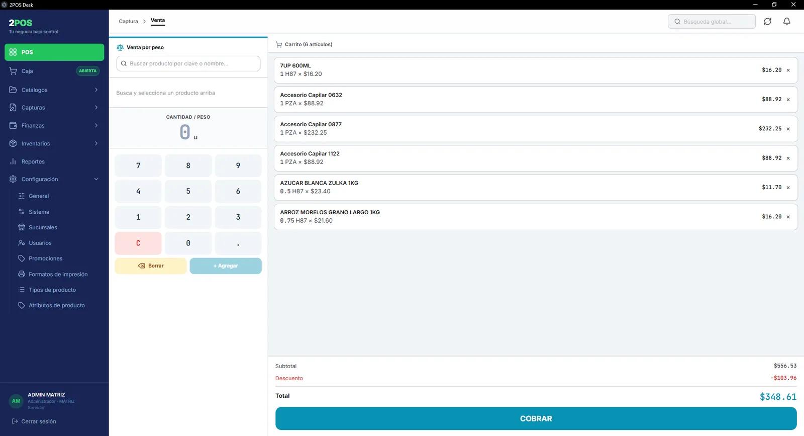 Caja de 2POS en modo Gramos, con un teclado numérico decimal y productos vendidos por fracción de kilo: 0.5 de azúcar y 0.75 de arroz.